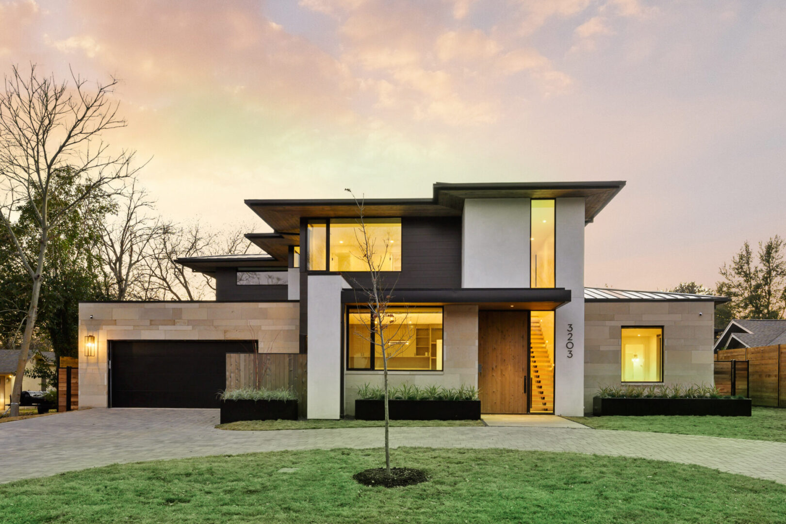 Modern home with a large front door.